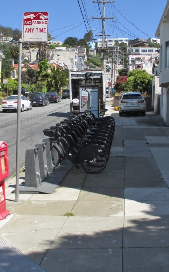 Bike share station at Monterey and Gennessee is full, but all electric one on this Friday morning. Photo: Sunnyside Neighborhood Association.